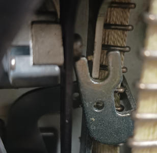 Stitch length toggle (left)